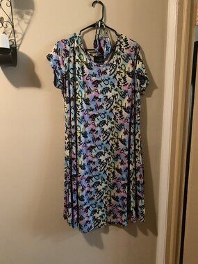 Multi colored dress with matching face cover